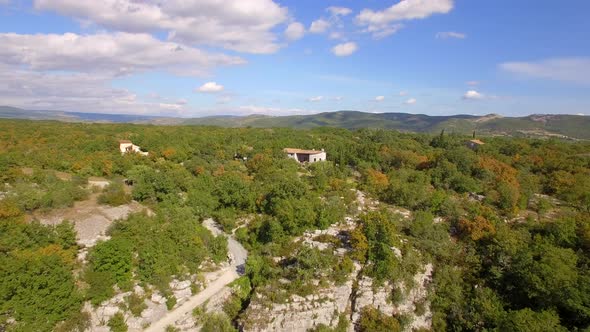 Aerial travel drone view of Balazuc, Southern France.