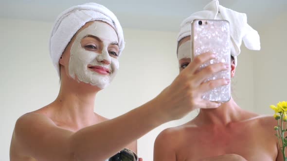 Beautiful Woman Having a Facial Treatment at Spa