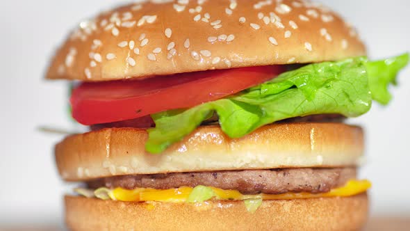 Panning Shot Rotating Juicy Fresh Fast Food Burger or Hamburger or Cheeseburger Closeup