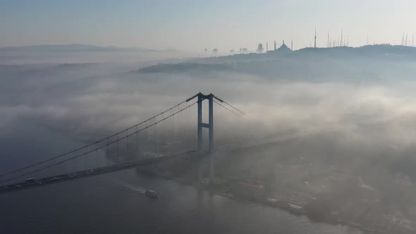 aerial video of bosphorus Bridge on a foggy day in Istanbul, Turkey, Martyrs Bridge