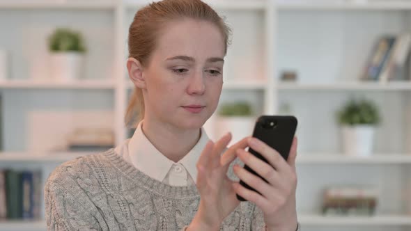 Portrait of Attractive Young Woman Using Smartphone 