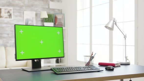 Isolated Mock-up Green Screen Monitor PC in Bright Living Room