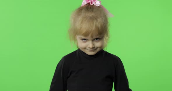 Pretty Girl Emotionally Makes Faces in Black Blouse. Portrait. Chroma Key