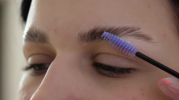 Beautician Makes Eyebrow Correction