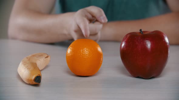 Man Picked an Apple and Bite It