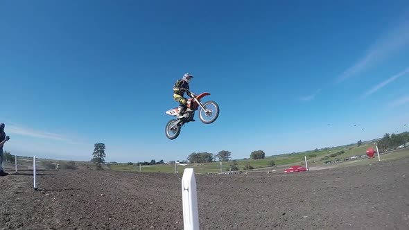 Men racing in a motocross motor sports race.