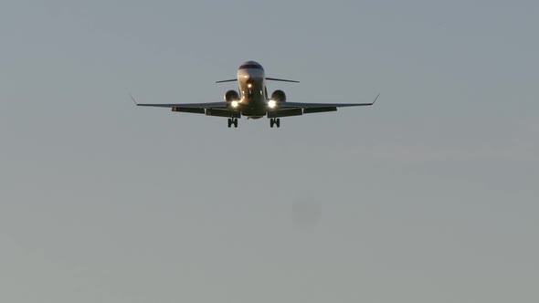 Modern Airplane Airliner Landing at Airport