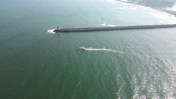 Boat crossing veracruz shoreline in Mexico