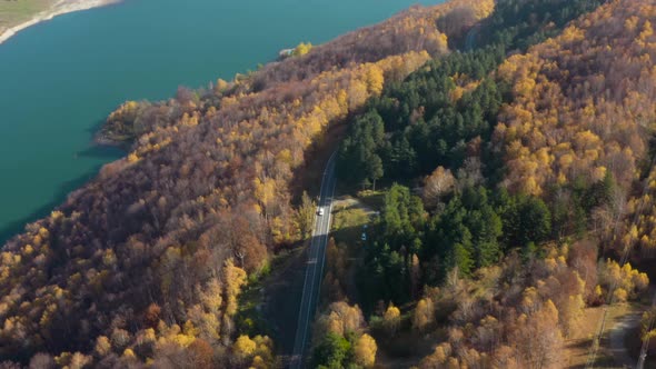 Flying Above Dam Lake and Road