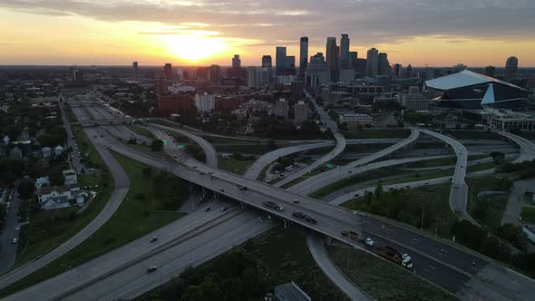 Minneapolis downtown aerial footage during sunset, beautiful skyline view with all the main highways