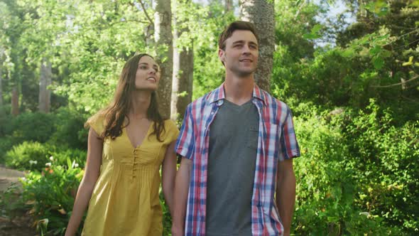 Happy caucasian couple in garden