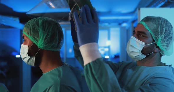 Doctors preparing to work inside hospital during coronavirus pandemic outbreak