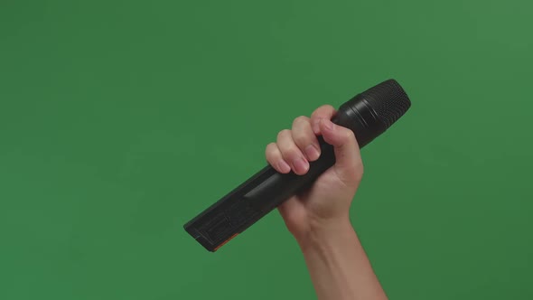 Male Hand Holding Microphone Background Green Screen Chroma Key