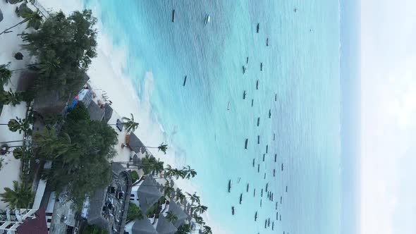 Tanzania Vertical Video  Boat Boats in the Ocean Near the Coast of Zanzibar Aerial View