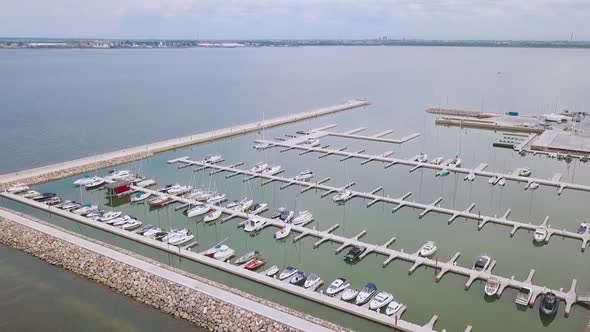 Marina, yachts stand near the pier