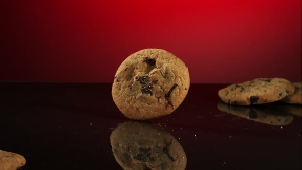 Cookies falling and bouncing in ultra slow motion 1500fps - reflective surface - COOKIES