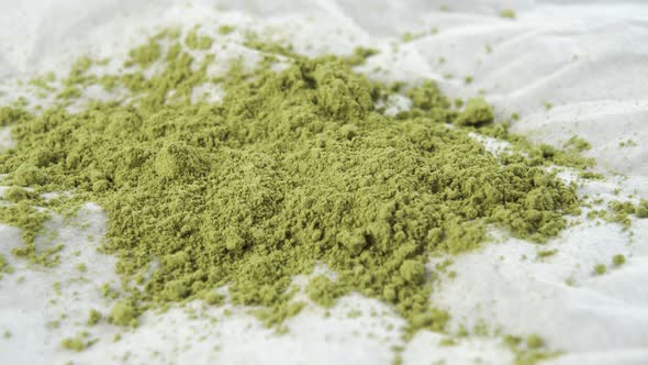 Natural Japanese matcha tea on a white paper napkin