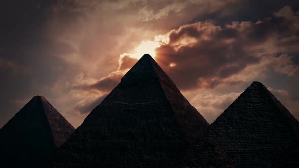 Sun Shines Out From Above Pyramids