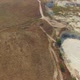 Quadrocopter Flies Over Field and Quarry - VideoHive Item for Sale