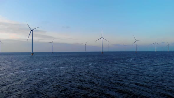 Windmill Park in the Ocean Drone Aerial View of Windmill Turbines Generating Green Energy Electric