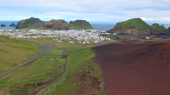 Flying over Eldfell volcano on Heimaey island (Westman Islands) in Iceland