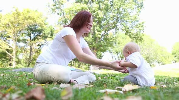 Happy Mother and Son at Park