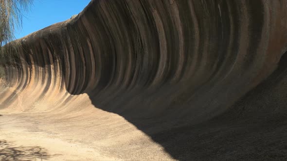 wave rock in western australia panning shot