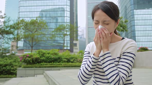 Woman feeling unwell at outdoor 