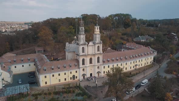 Aerial View of Catholic Cathedral Monastery in Autumn. City Buchach, Ukraine