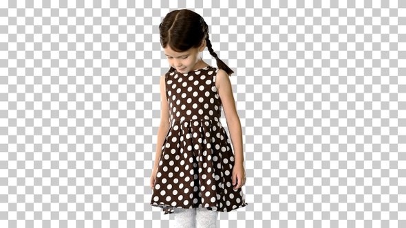 Little girl in polka dot dress looking, Alpha Channel