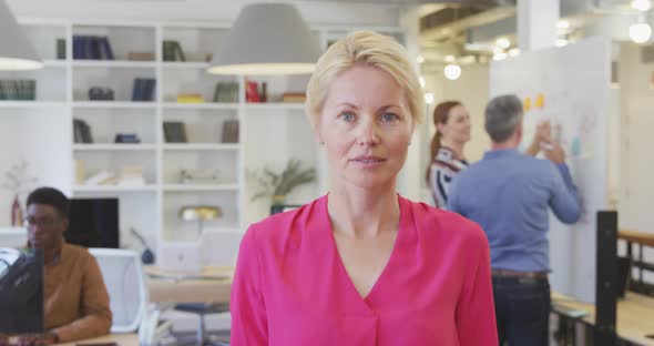 Business woman smiling at the camera