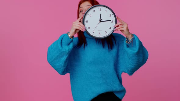 Young Woman Holding Clock Watch Hiding Checking Time on Clock Running Late to Work Being in Delay