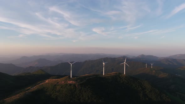 Wind Turbines in mountain during sunset