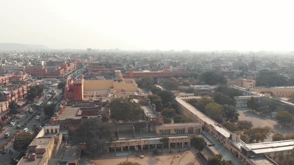 Misty cityscape of Jaipur in busy traffic roads on a sunny morning in Rajasthan, India