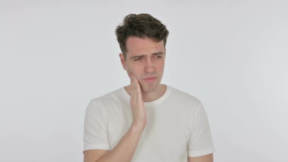 Young Man with Toothache on White Background