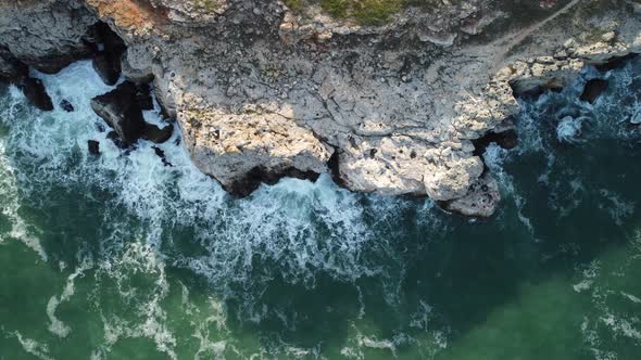 Aerial View of Sea Waves and Fantastic Cliffs Rocky Coast