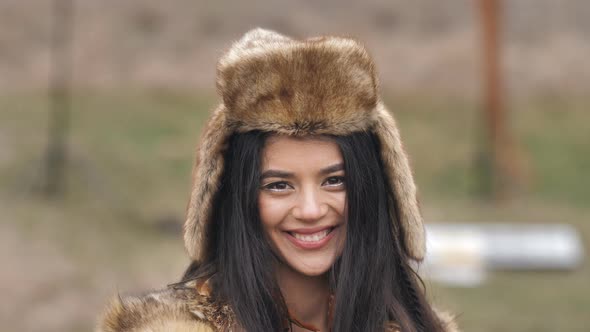 portrait of a beautiful mestizo woman sending a kiss to the camera