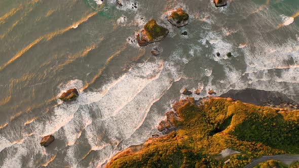 Aerial view of coastal cliff formation at Nine Mile, West Coast.