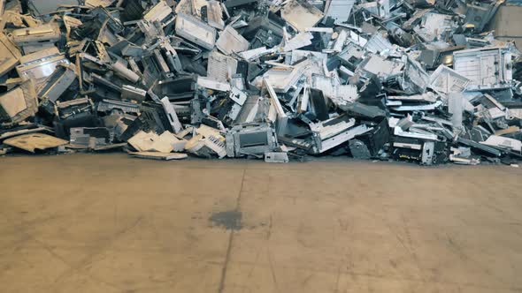 Waste, Plastic Trash, Garbage Recycling Plant. Massive Pile of Broken Copying Machines in a Landfill