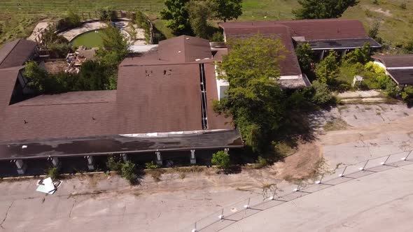 Aerial View Of Abandoned Building Of Sugar Loaf Ski Resort In Leelanau County, Michigan. sideways