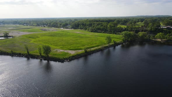 Slow Pan of the coastal region at Muskegon Lake.