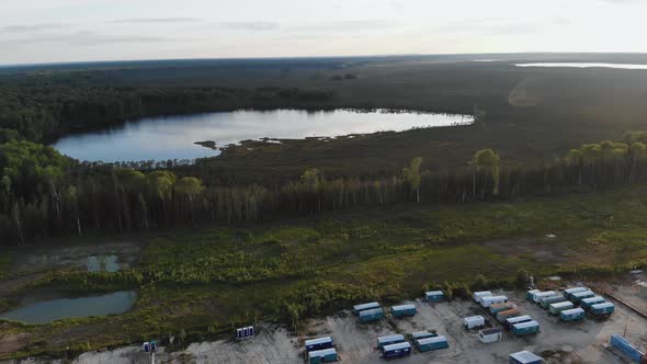 Tundra in Siberia, Drone Flying Over Conifers and Mobile Homes in the Countryside, Outskirts of a