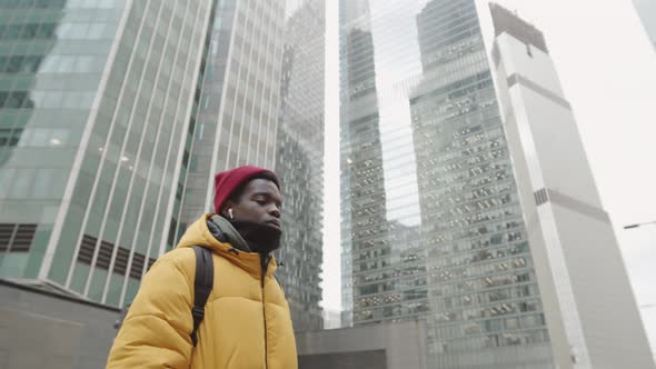 African Teenager on Walk in City Center