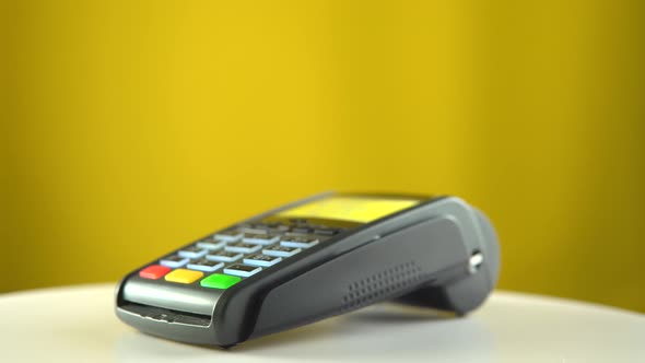 Payment Terminal on Color Background