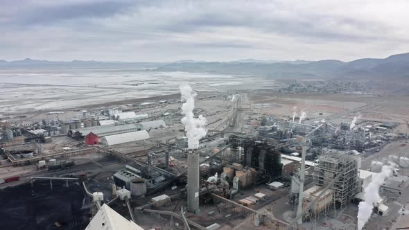 Drone Shot of Industrial Zone with Thick Smog and Burning Fossil Fuels USA