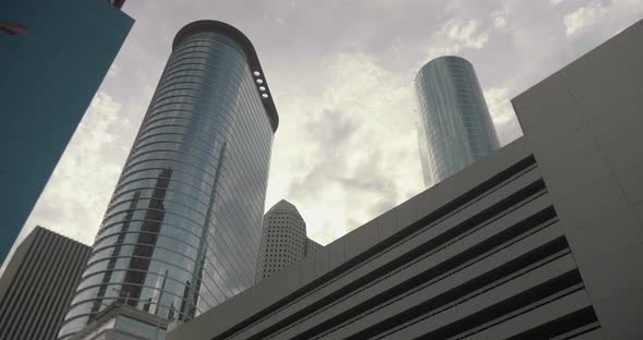 This video is a low angle  establishing shot of skyscrapers in downtown Houston. This video was film