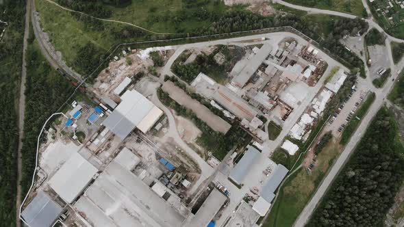 Aerial view of typical russian metallurgy factory. Huge plant with workshops
