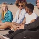 Lounging Young Friends on City Coastline - VideoHive Item for Sale