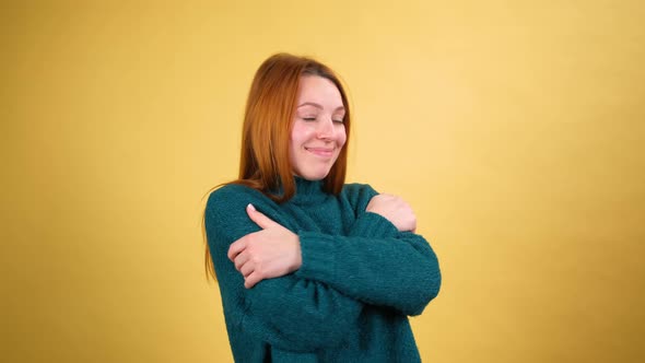 Young Red Hair Woman Posing Isolated on Yellow Color Background Studio