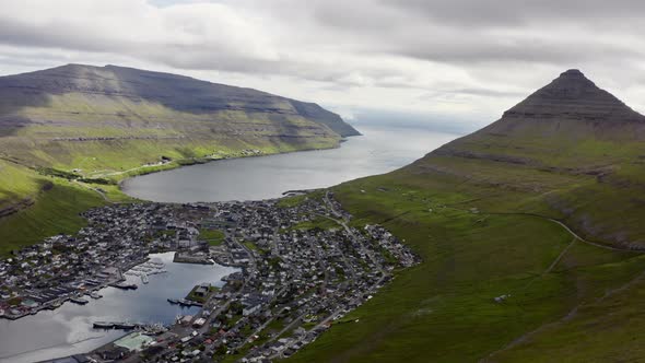 Drone From Klakkur To Klaksvik Town Below